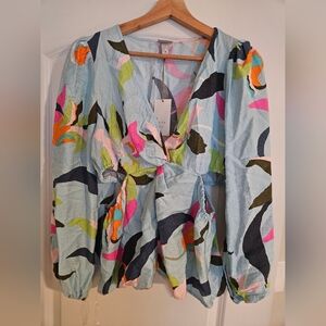 Vibrant Floral Print Blouse with Puff Sleeves and Waist Cutouts